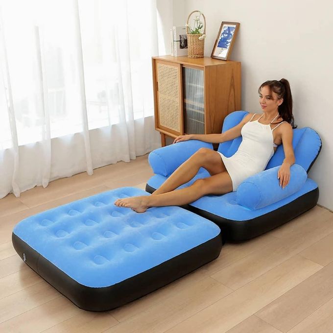 Inflatable air lounger with an integrated extension